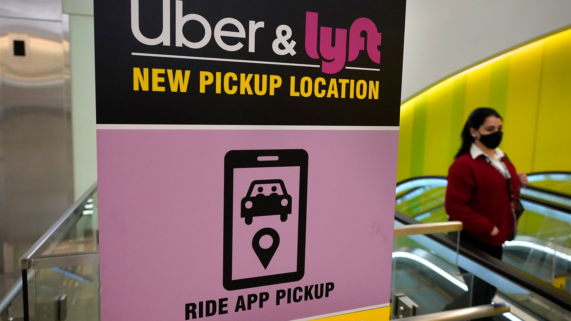 Uber and Lyft settle with drivers over pay and benefits in a Massachusetts lawsuit