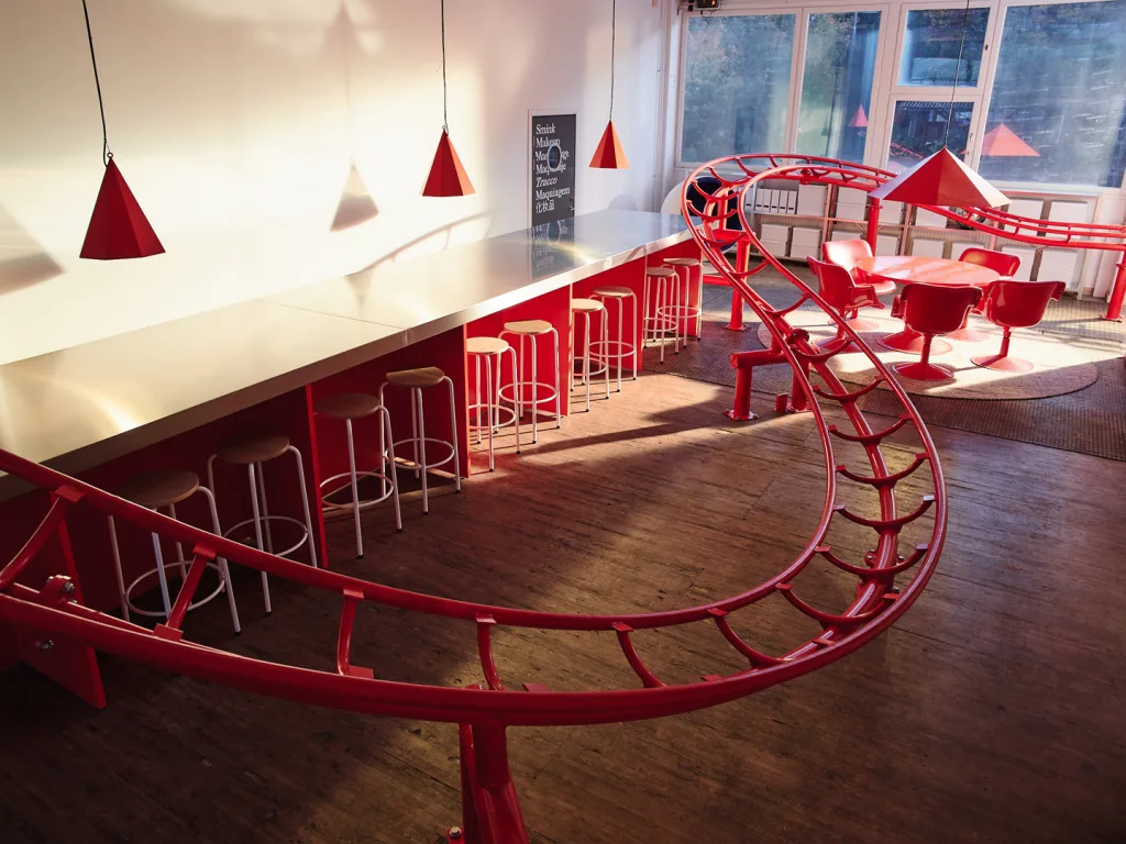 Think your office is fun? This Swedish studio has a fully-functioning indoor roller coaster