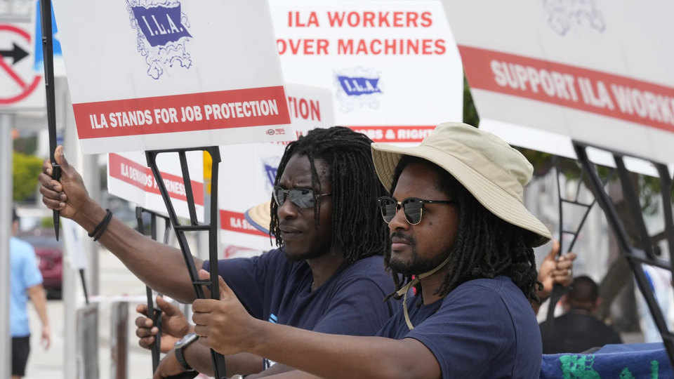 Dockworkers’ union suspends port strike until mid-January